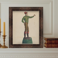 Framed artwork of a figure on a pedestal against a white wall with decorative molding.