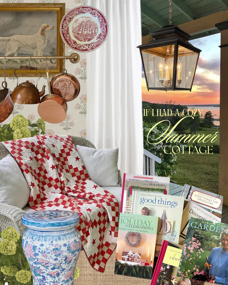 A styled interior scene with a red-and-white checkered quilt draped over a white armchair, a blue-and-white floral ceramic jar, several cookbooks, framed wall art, hanging copper pots, and a large black lantern. A large window shows a sunset landscape, and overlaid text reads 'IF I HAD A COZY Summer Cottage.