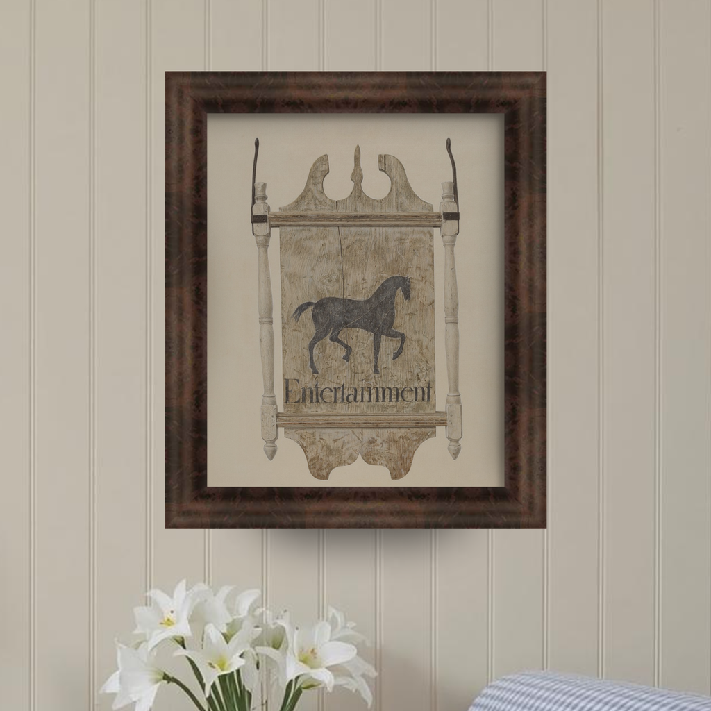 Framed artwork with a horse illustration on a wall with floral decor.