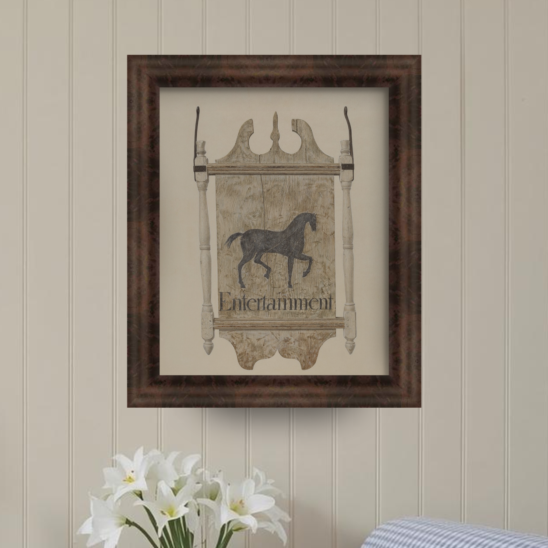 Framed artwork with a horse illustration on a wall with floral decor.