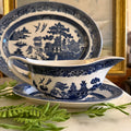 2-piece vintage Johnson Brothers Blue Willow gravy boat and matching oval underplate set.