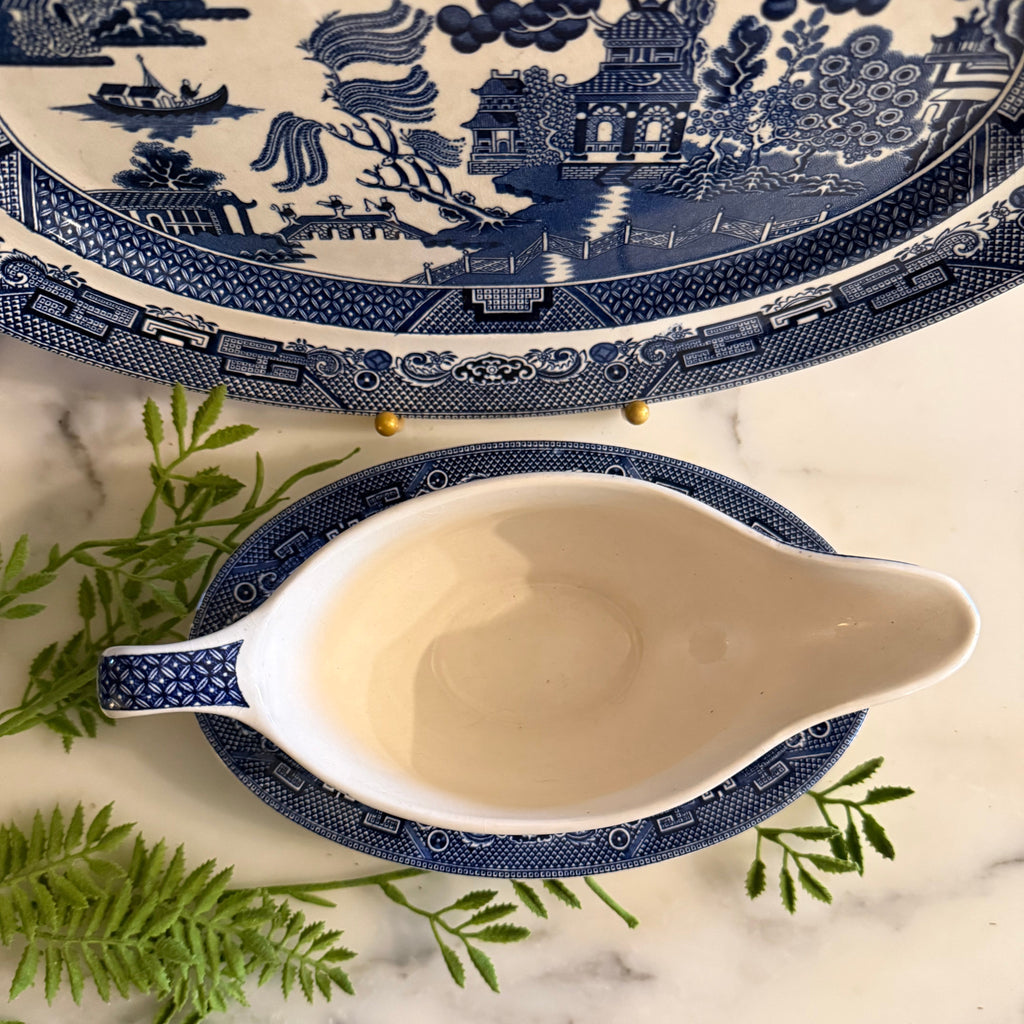 Close-up of the oval ironstone liner plate for the Blue Willow gravy boat.
