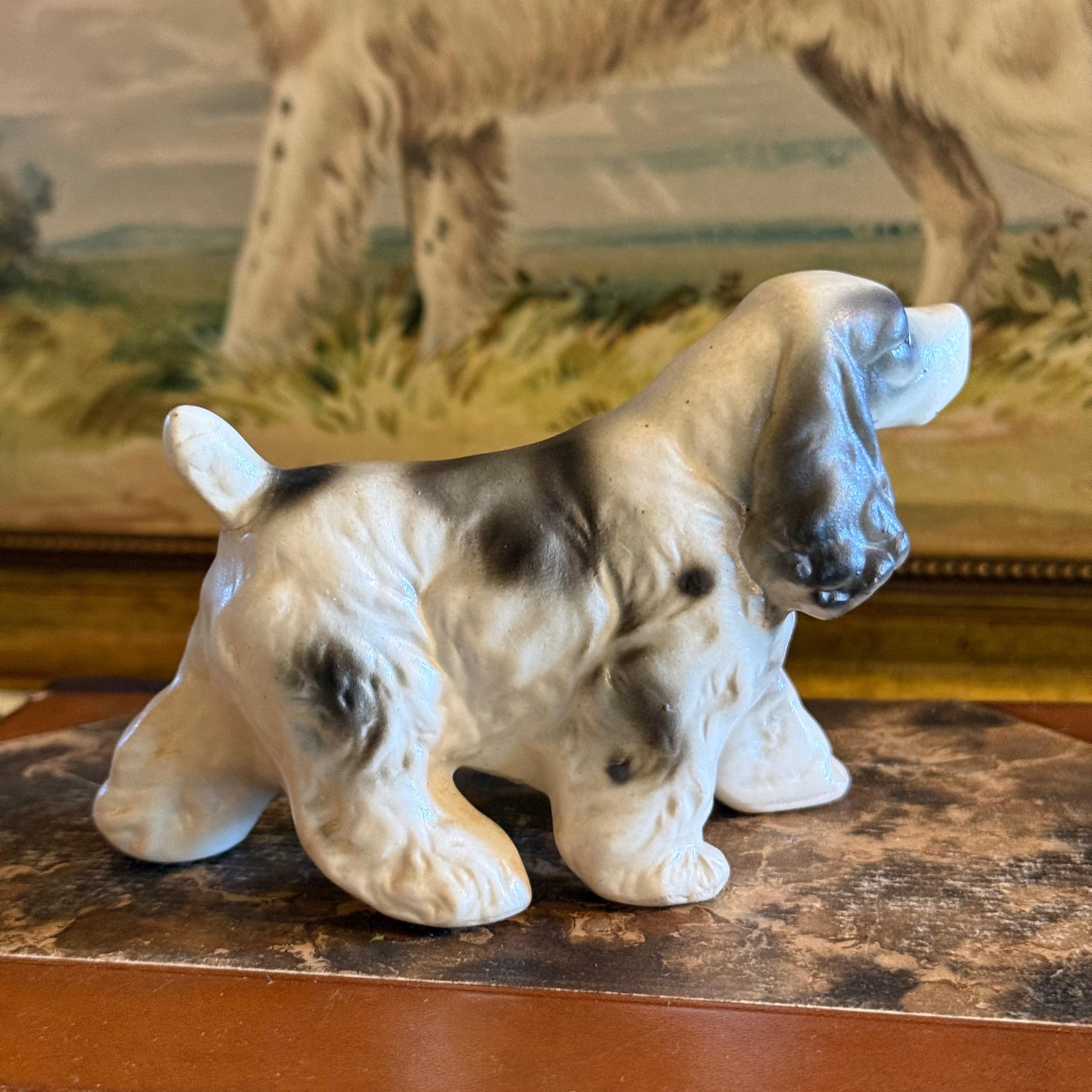 Full side view of the vintage English Setter figurine showing its athletic stance and feathered tail detail.