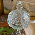 Clear Indiana Glass vintage glass candy dish with diamond point intricate design on antique book