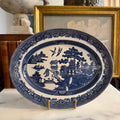 Front view of a vintage Johnson Brothers Blue Willow 12 inch oval serving platter.