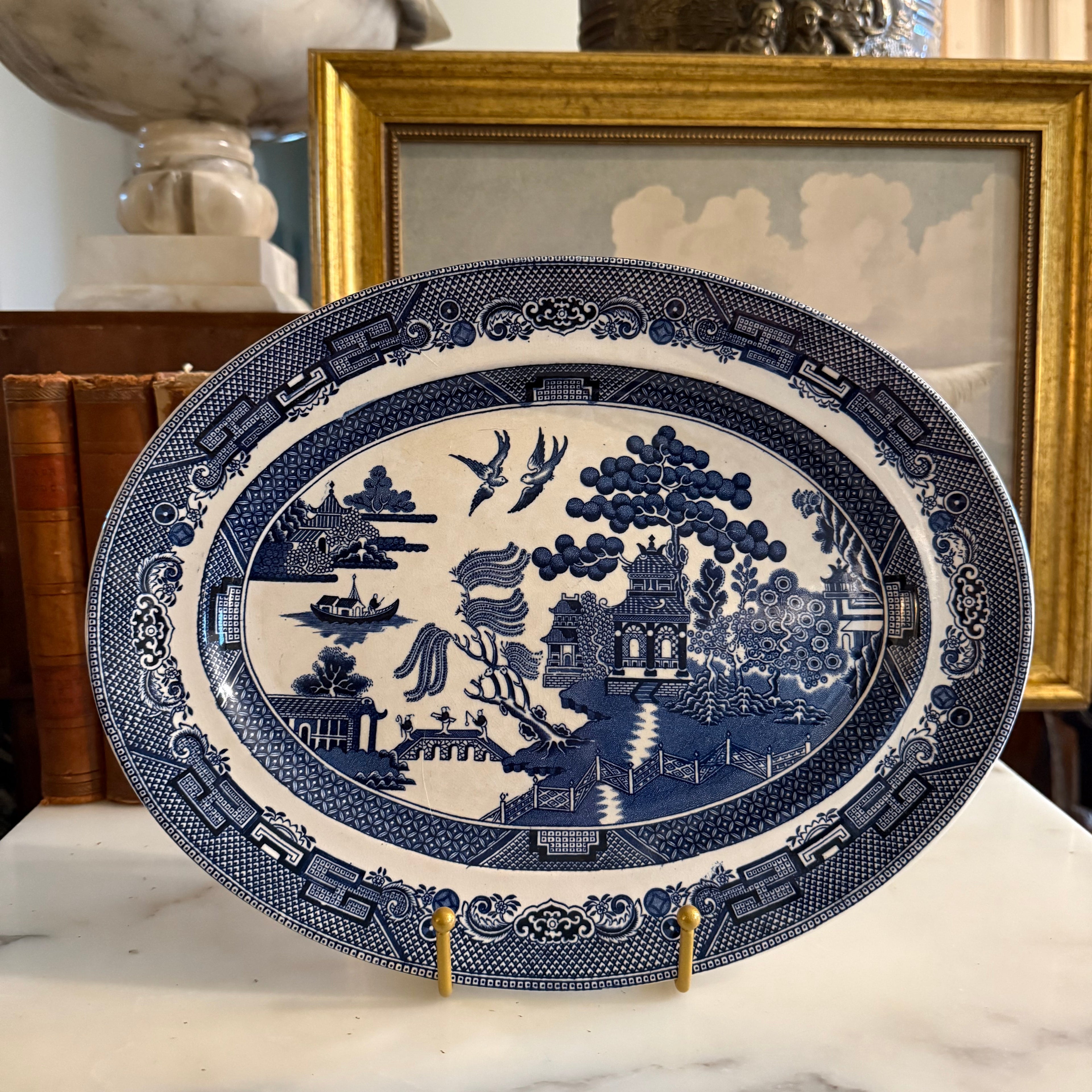 Front view of a vintage Johnson Brothers Blue Willow 12 inch oval serving platter.