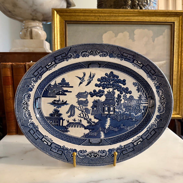 Front view of a vintage Johnson Brothers Blue Willow 12 inch oval serving platter.