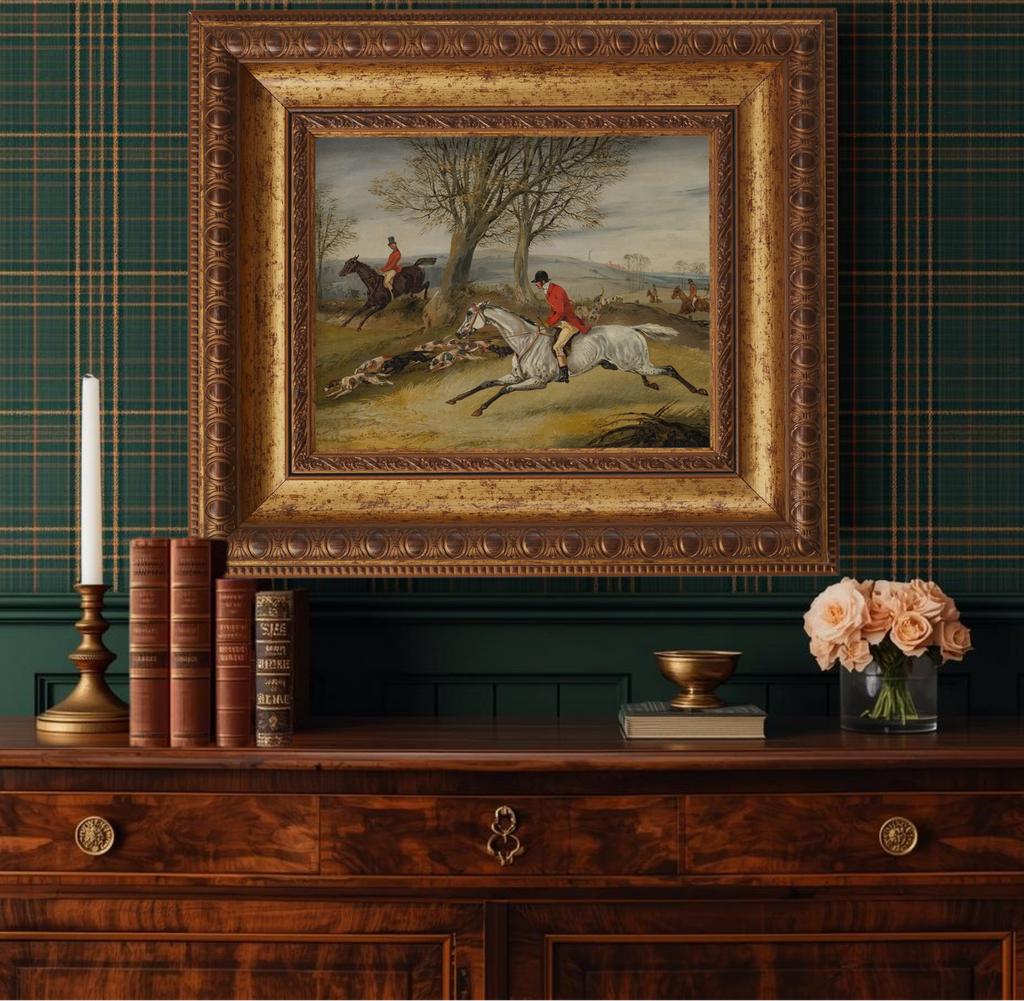 Traditional English fox hunting art in a gold Arqadia frame styled above a mantle in a classic living room.