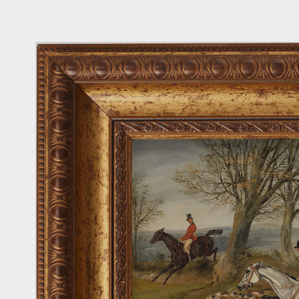 Detailed close-up of the amber-toned gold frame and the fine linen canvas texture on the Full Cry hunting scene.