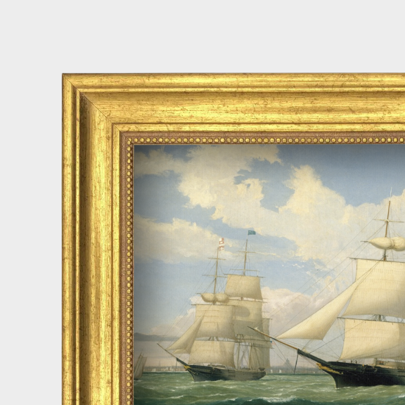 Close-up shot of the aged gold frame and fine art linen texture of the Winged Arrow nautical print.