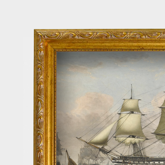 Close-up shot of the archival linen-textured paper and hand-finished antique frame for the H.M.S. Britannia print.