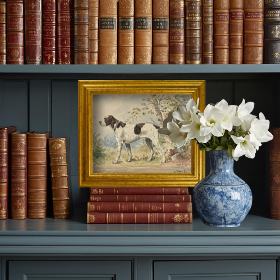 Leather bound antique books and spring blue willow vase featuring The Field Dog No. 02 on and English shelf.