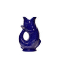 An authentic Large Cobalt Blue ceramic fish-shaped Gluggle Jug pitcher, standing on a clean white background.