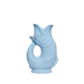 An authentic Large Pale Blue ceramic fish-shaped Gluggle Jug pitcher, standing on a clean white background.