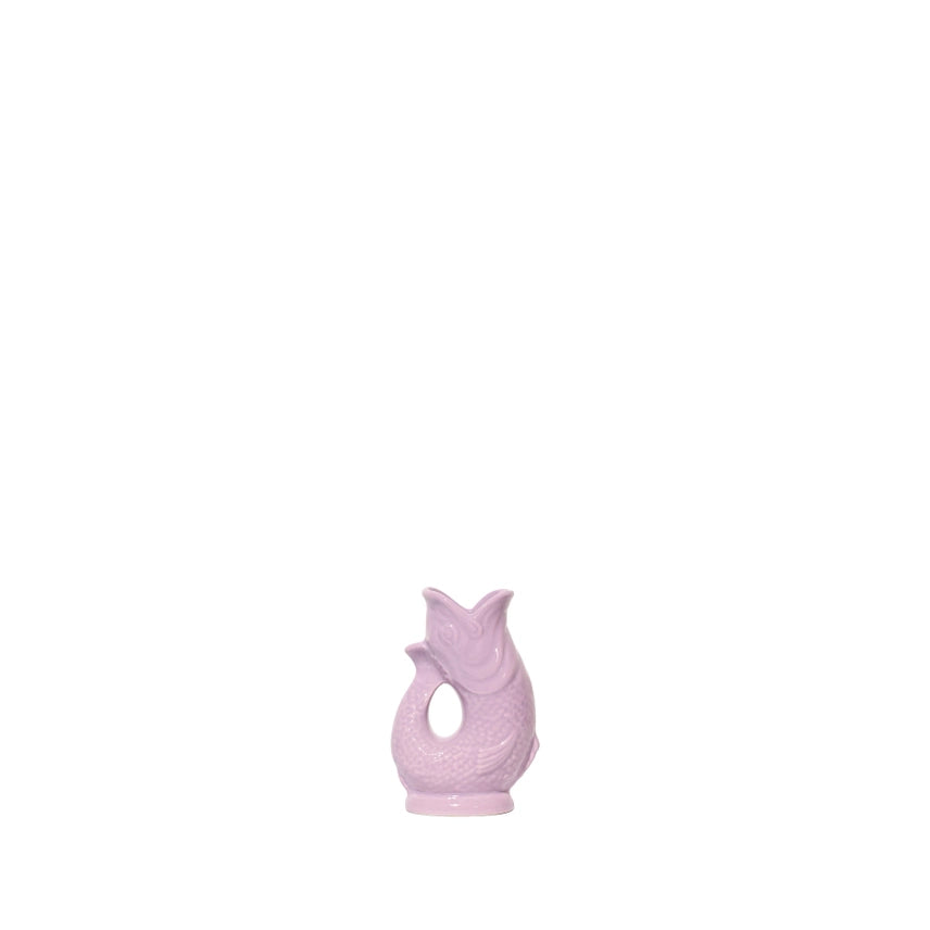 An authentic Mini Lilac ceramic fish-shaped Gluggle Jug pitcher, standing on a clean white background.