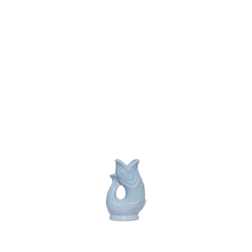 An authentic Mini Pale Blue ceramic fish-shaped Gluggle Jug pitcher, standing on a clean white background.