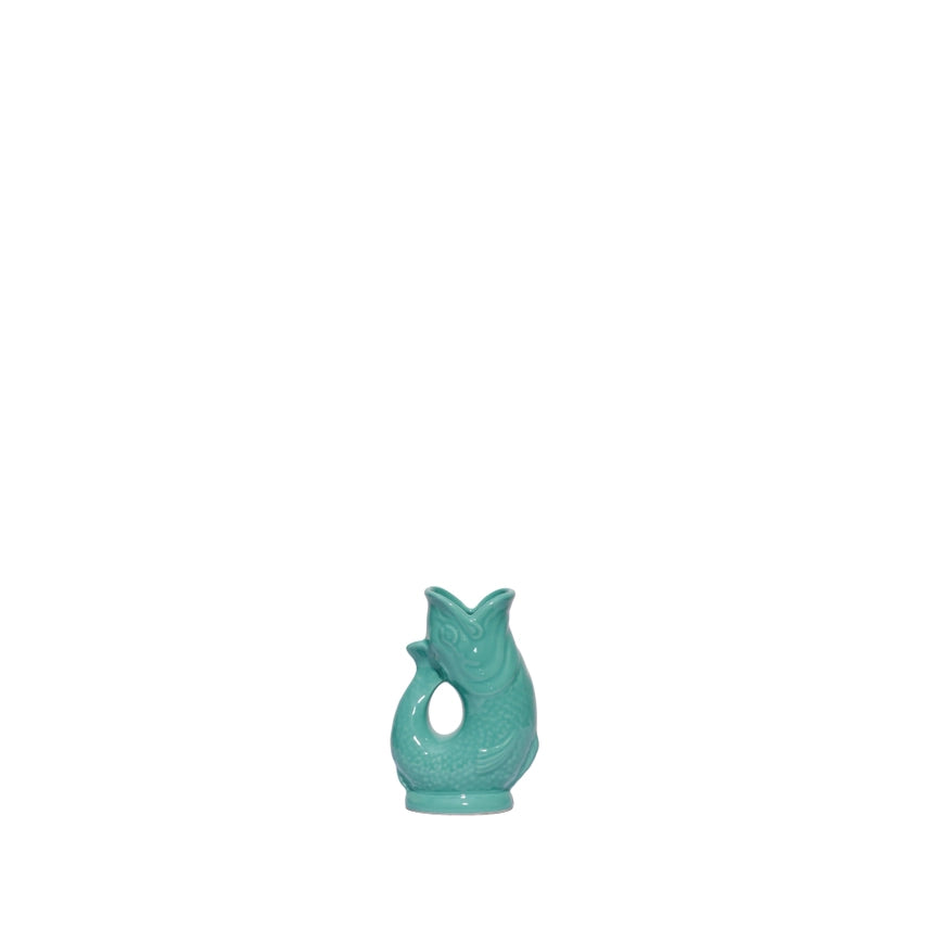 An authentic Mini Sea Green ceramic fish-shaped Gluggle Jug pitcher, standing on a clean white background.