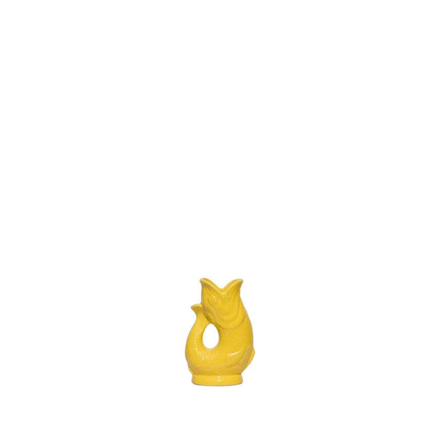 An authentic Mini Yellow ceramic fish-shaped Gluggle Jug pitcher, standing on a clean white background.