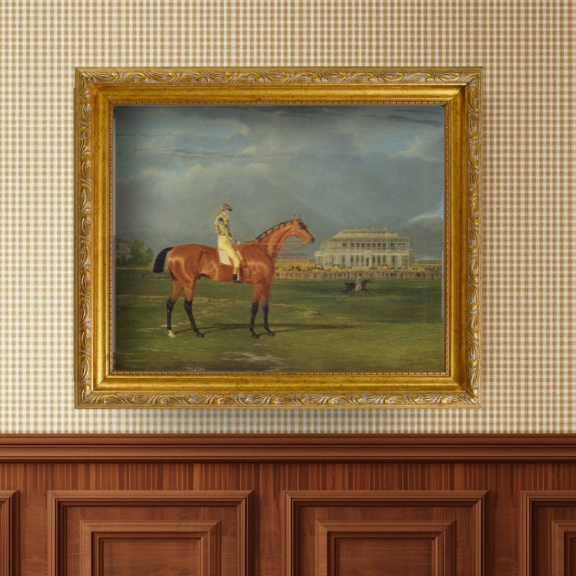 Traditional equestrian-inspired decor featuring a vintage horse racing print in a sophisticated manor-style library.
