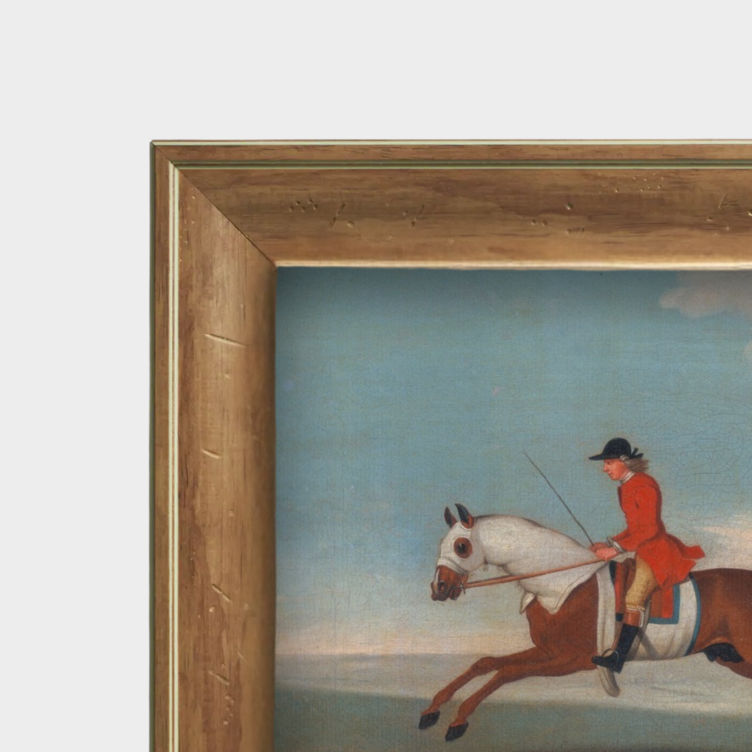 Detailed close-up of the grain on the English pine frame and the fine linen canvas texture of the horse portrait.