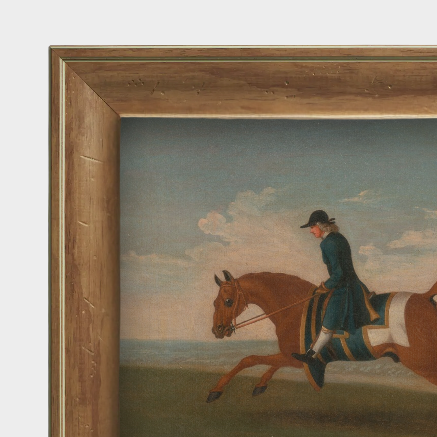 Close-up of the English pine wood grain and the authentic linen texture on the racehorse portrait print.