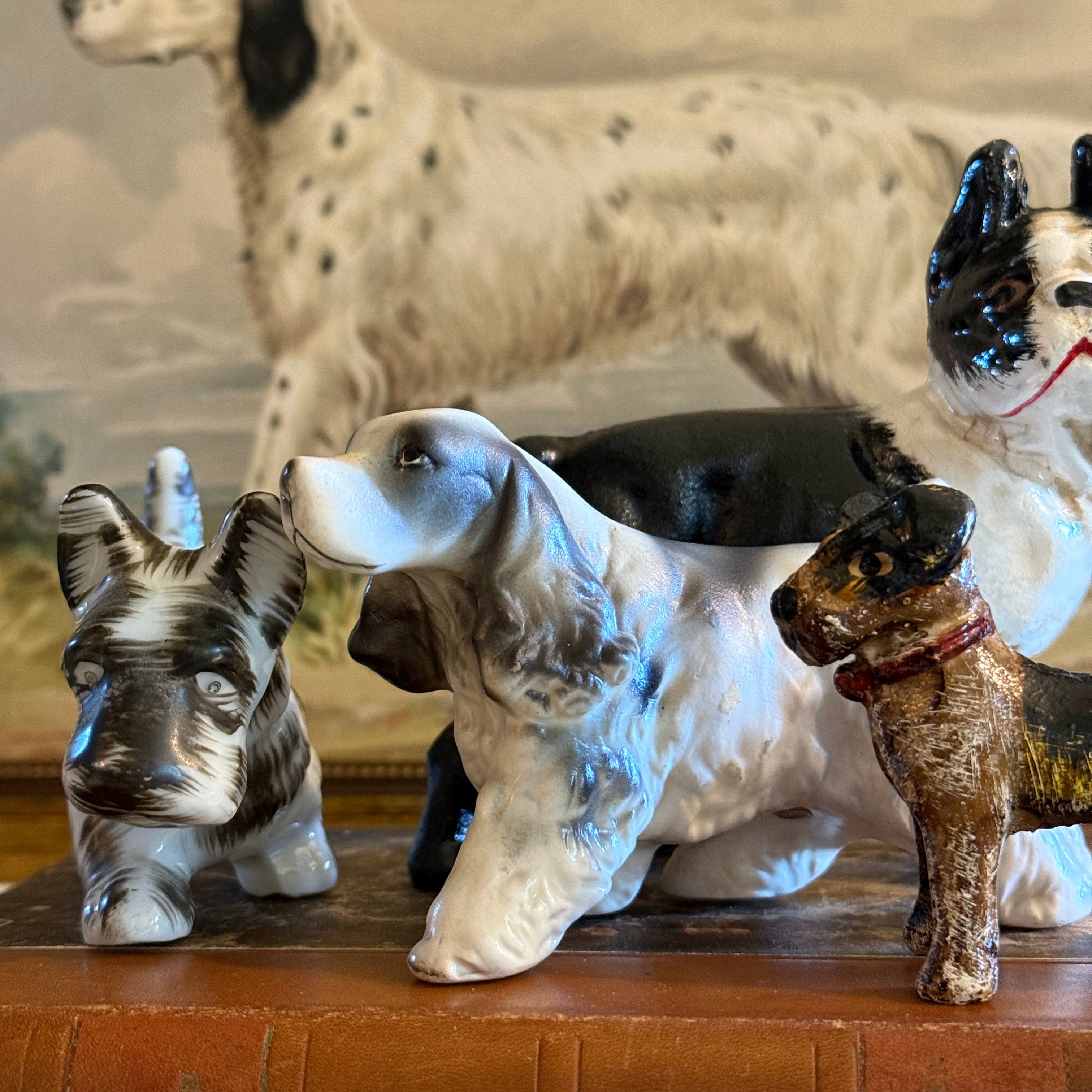 A group shot featuring the English Setter alongside other vintage Japanese ceramic dogs for scale and collection ideas.