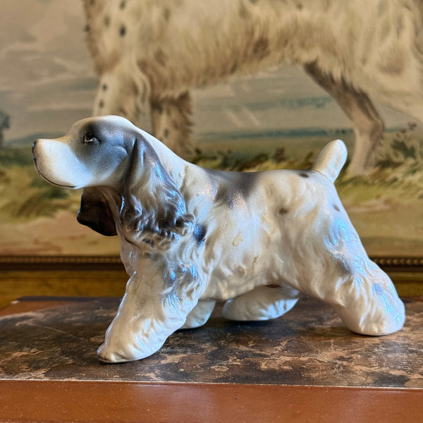 Side profile of a vintage ceramic English Setter figurine with black and white spotted details, made in Japan.