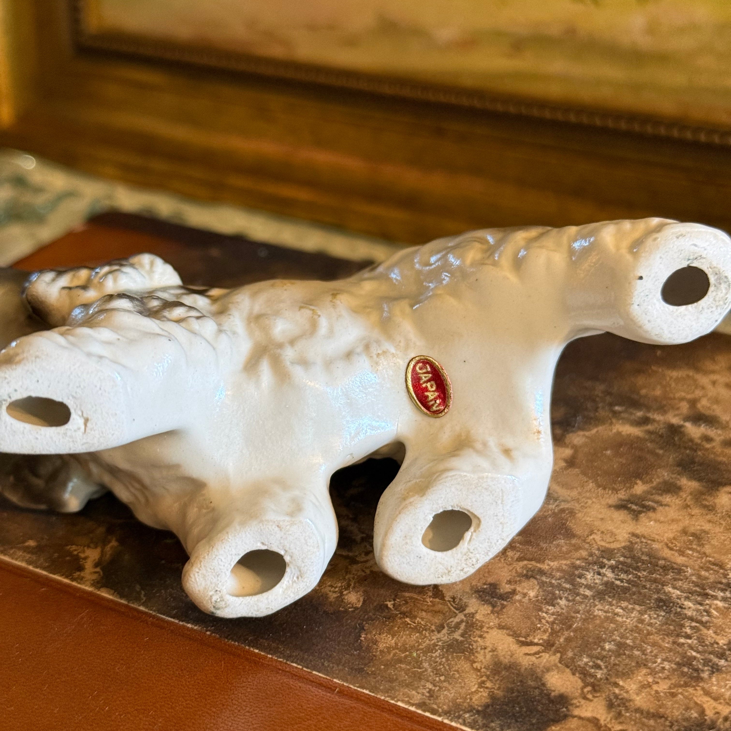 Japan stamp view of the hand-painted English Setter figurine highlighting the black spotting and glossy glaze.