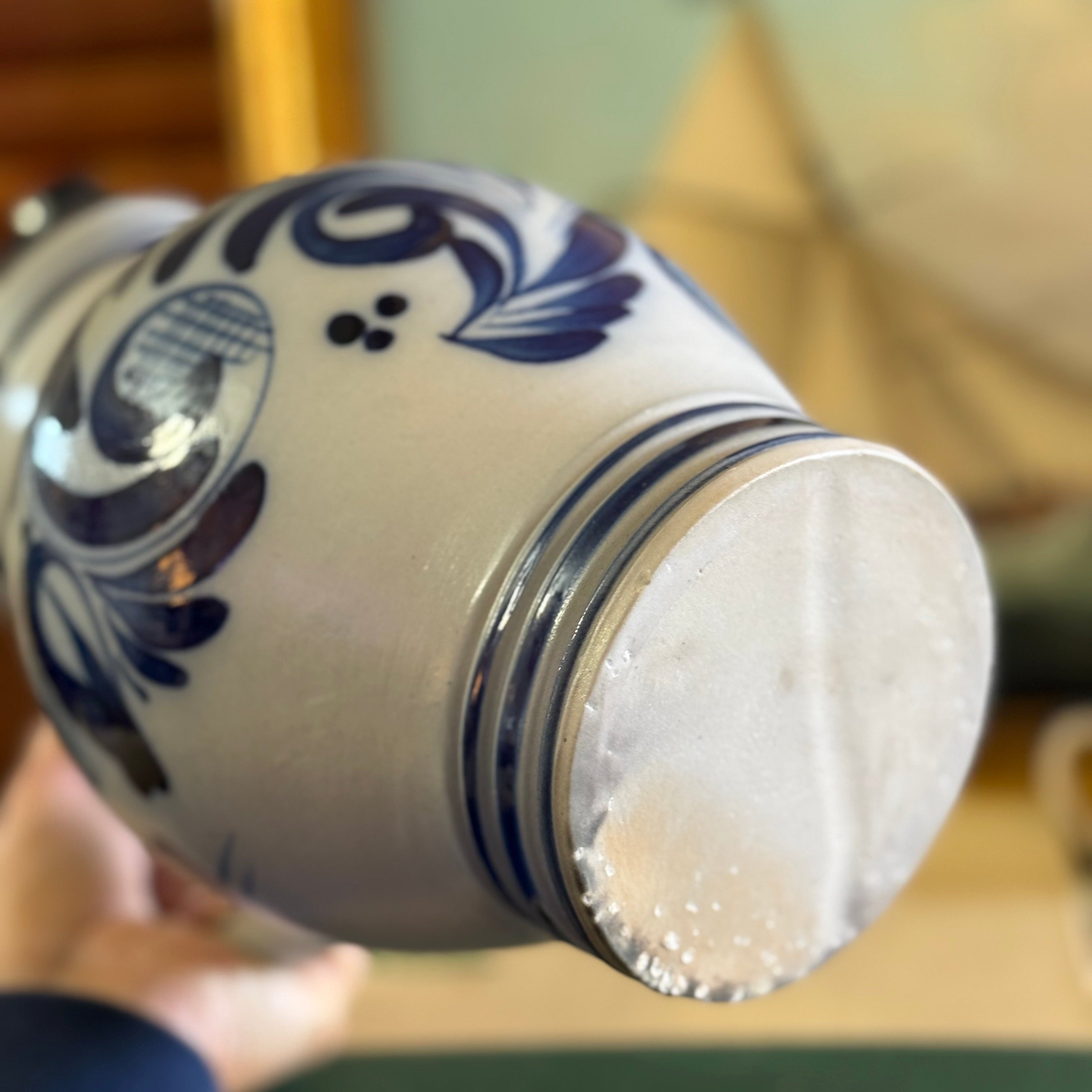 The unglazed bottom base of an authentic antique Westerwald pottery pitcher.